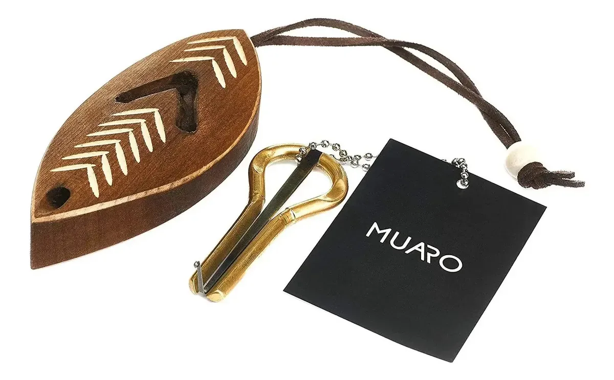 Harpa Judaica de Muaro de P.potkin em uma caixa de madeira escura (instrumento musical da boca)