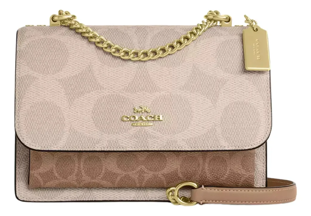Bolsa tiracolo Coach Klare em tela de assinatura bloqueada