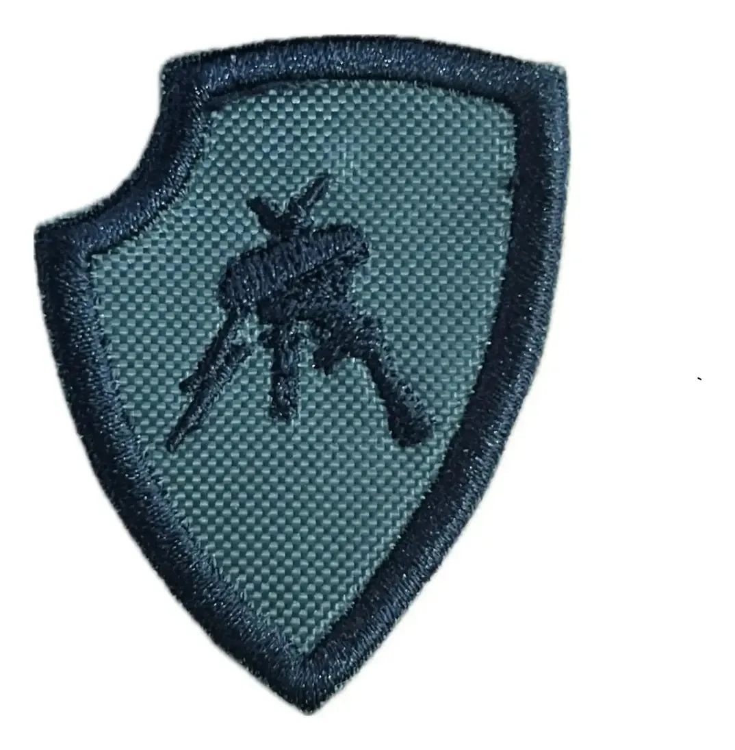 Tecido, tecido, emblema de tecido, braço, peito, boina