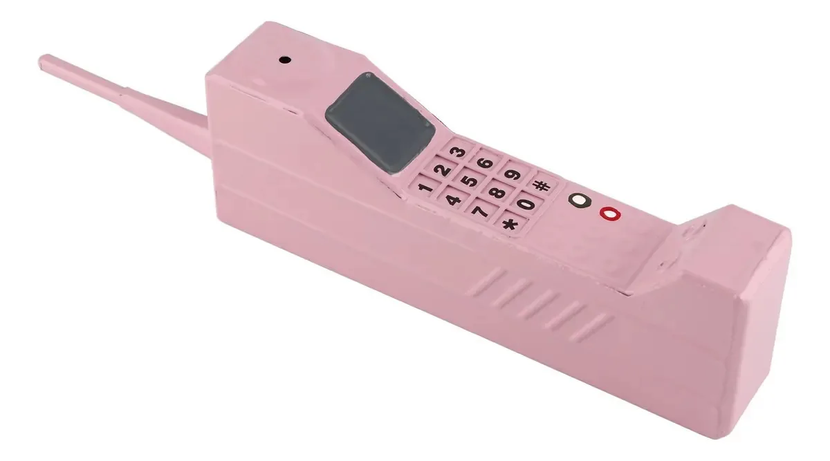 Modelo de celular retrô para adereços de filme rosa