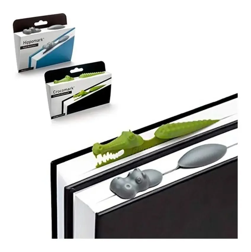 2 marcadores, livros, cadernos de crocodilo e hipopótamo