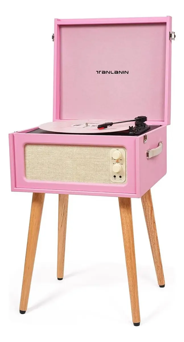 Toca-discos vintage de vinil rosa em pé com pernas