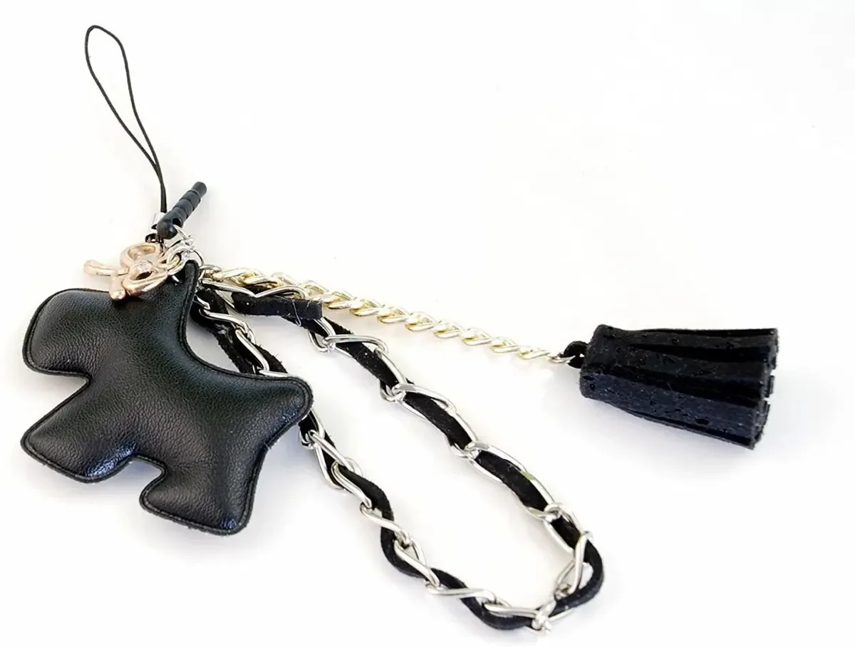 Plugue antipoeira com franjas Zzybia Black Dog