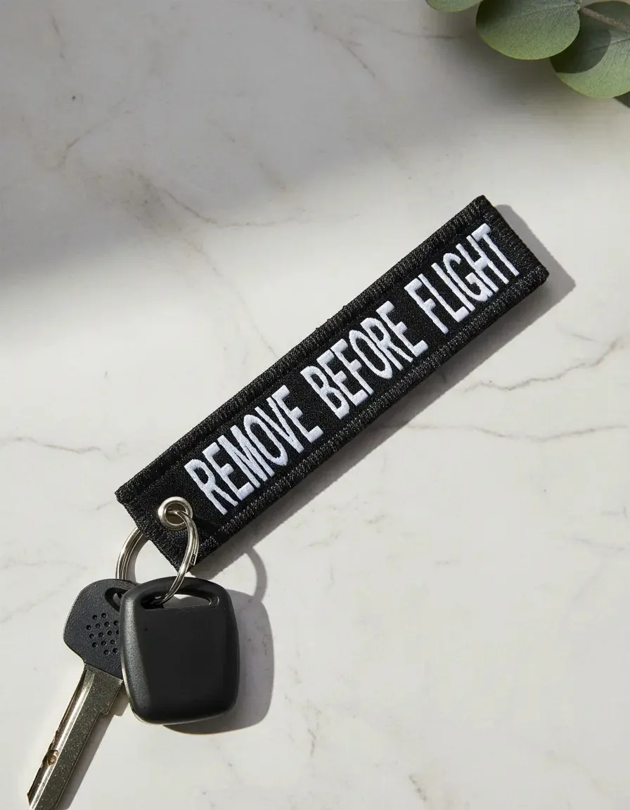 Chaveiro Remove Before Flight Aviação Tramado Frente Verso Cor Preto