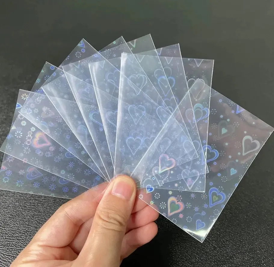 Cartões protetores Tcg Folios X100u 65x90mm, brilhantes, transparentes com padrão de coração