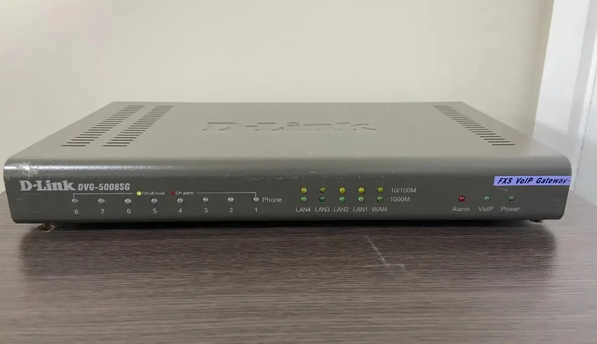 Dvg-5008sg Roteador Voip D-link Com Switch 4 Portas Cor Cinza