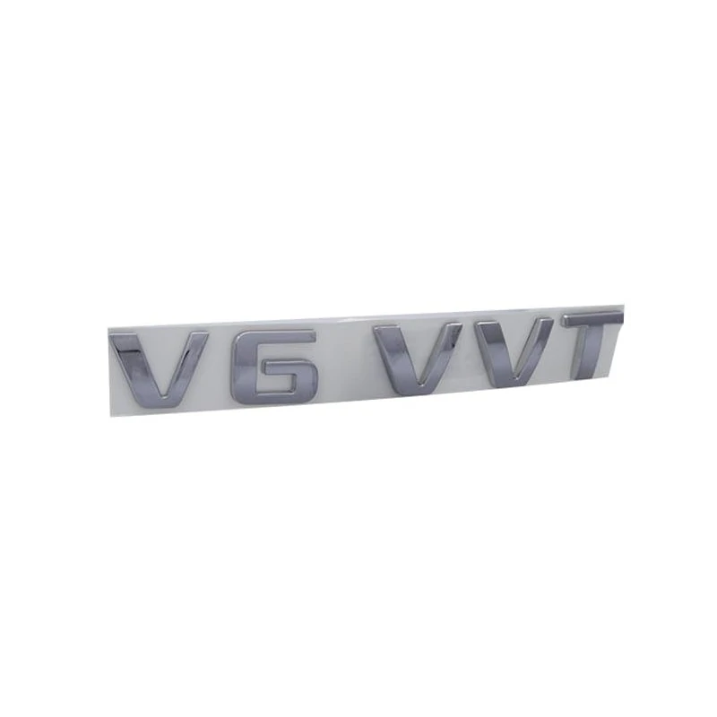 Emblema Tampa do Porta-malas (V6 VVT) CHEVROLET - GM TRAILBLAZER - GENERAL MOTORS 94706365