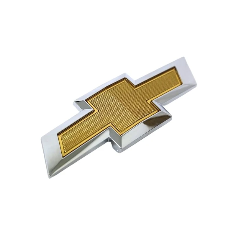 Emblema do Porta-malas (Gravata Dourada) CHEVROLET - GM SONIC - GENERAL MOTORS 95019521